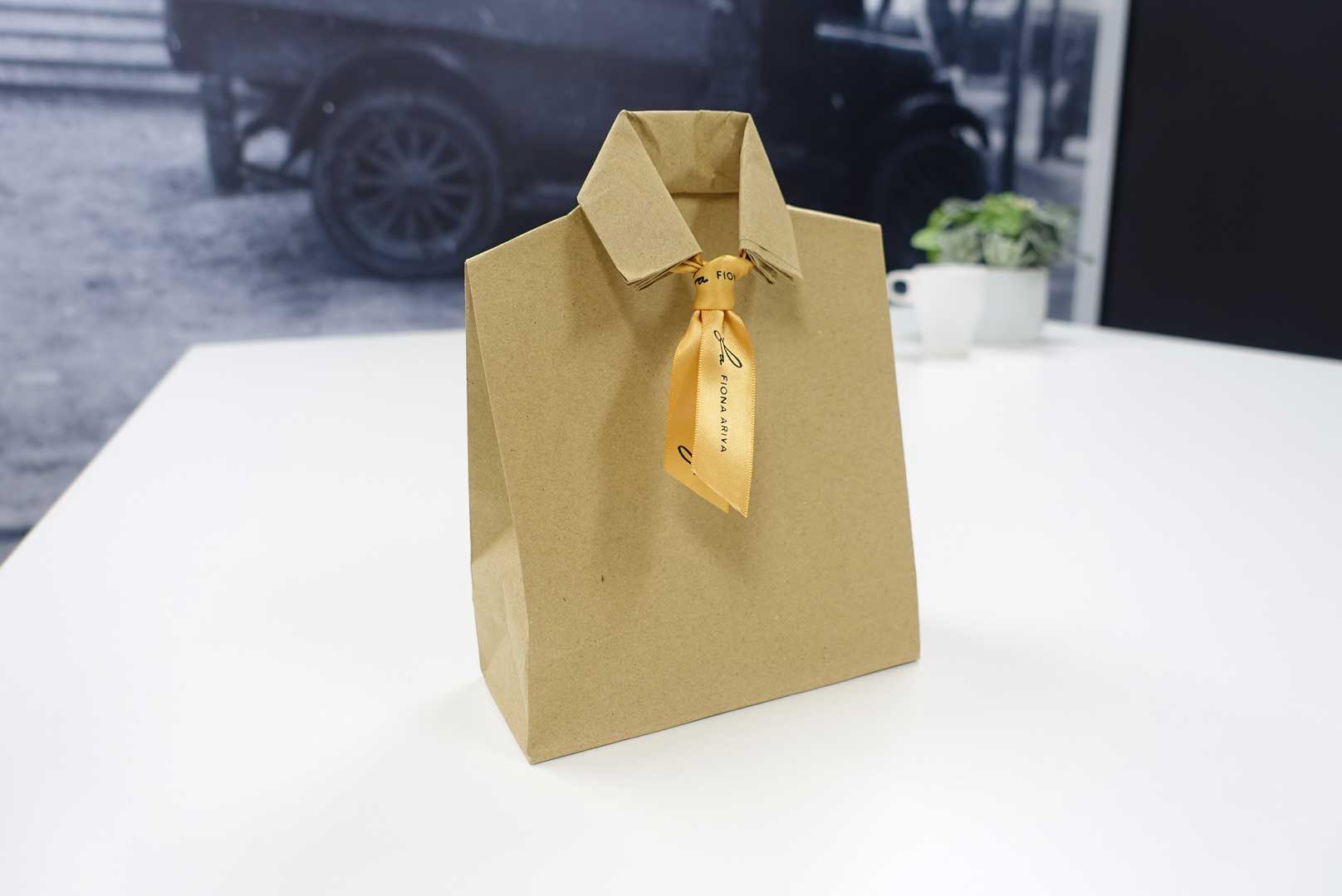 Creating and easy gift wrapping idea with a paper bag Shirt and