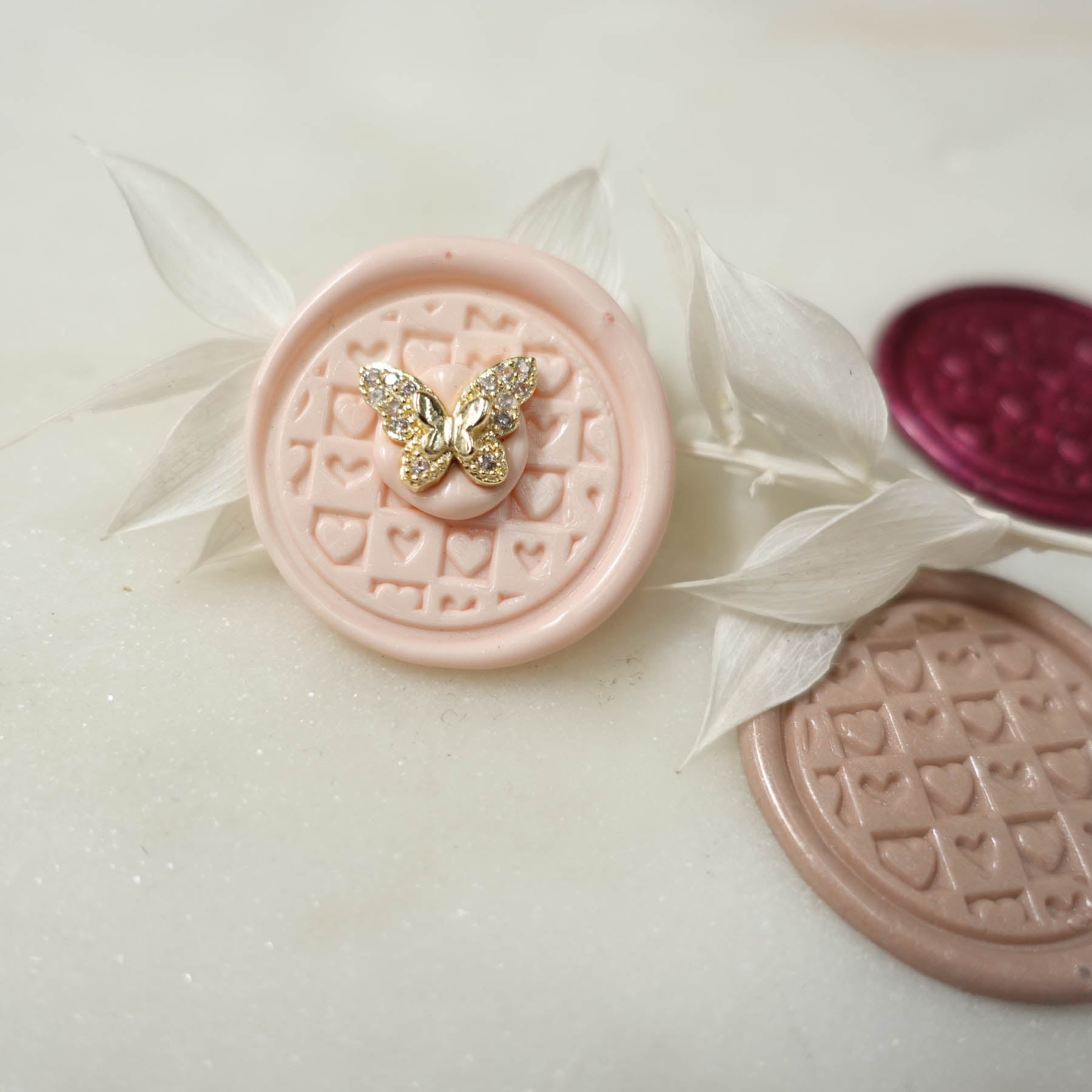 chequered hearts patchwork pattern wax seal fiona ariva australia with butterfly charm