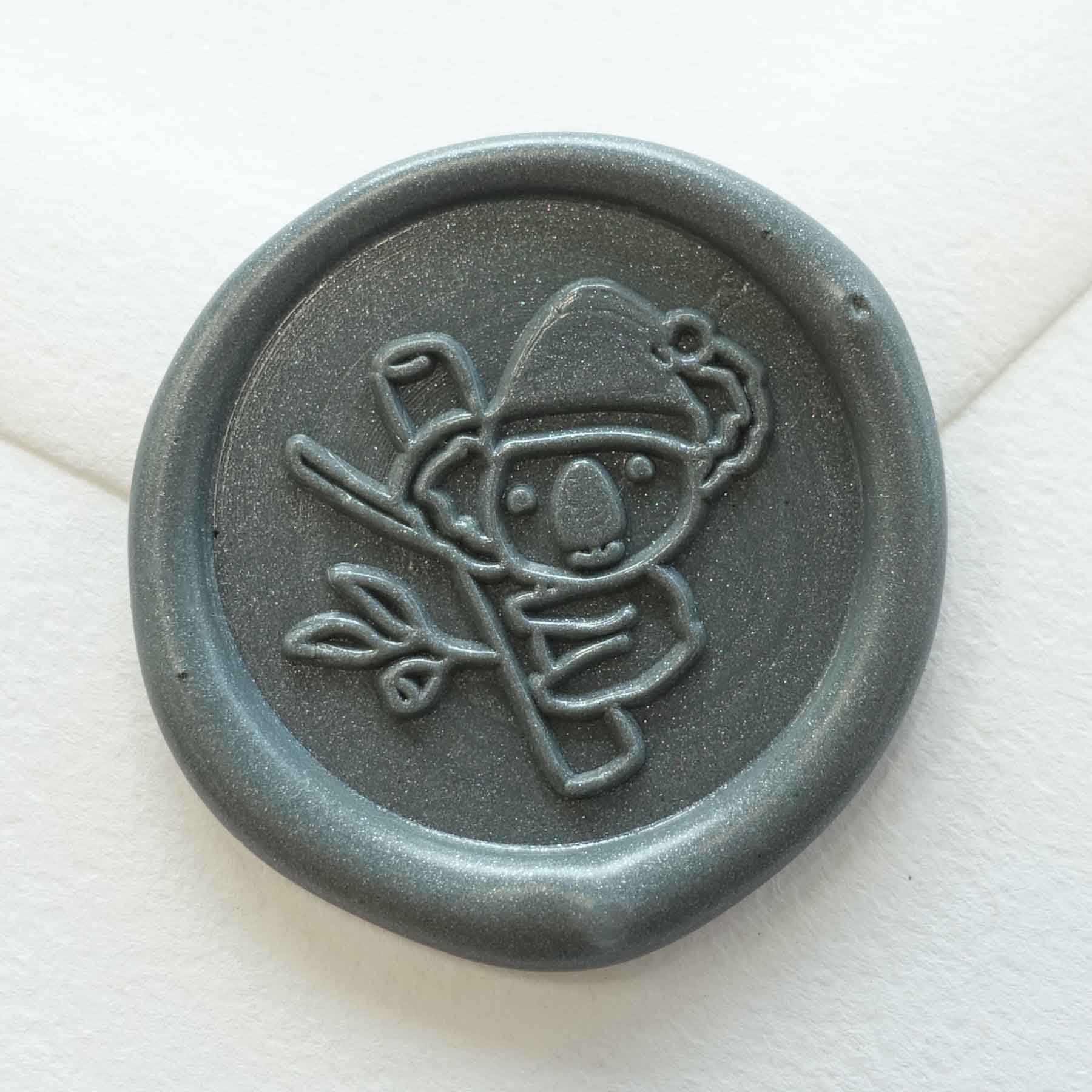 fiona ariva christmas santa koala wax seal stamp with eucalyptus leaves