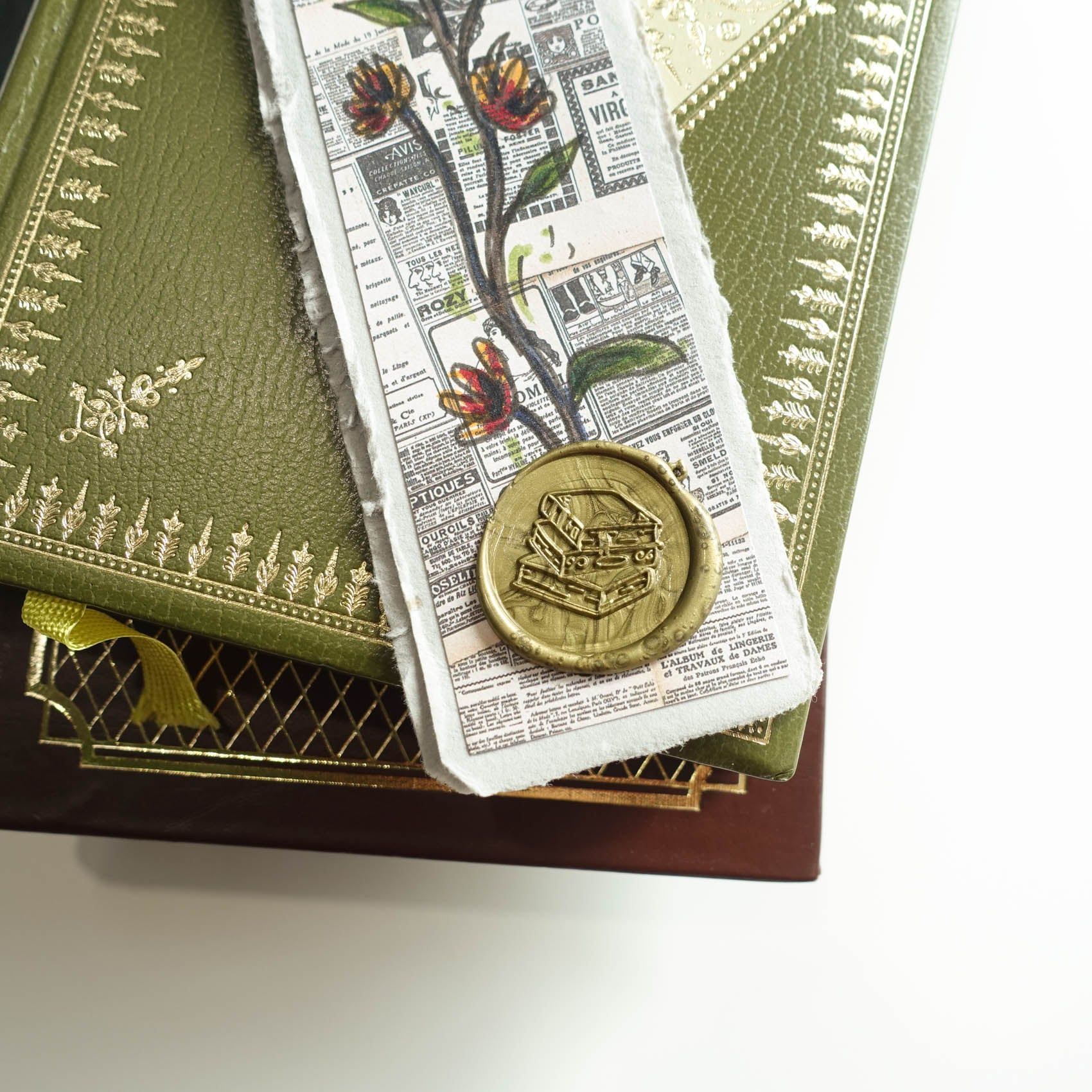 stack of books wax seal stamp fiona ariva australia bookmark