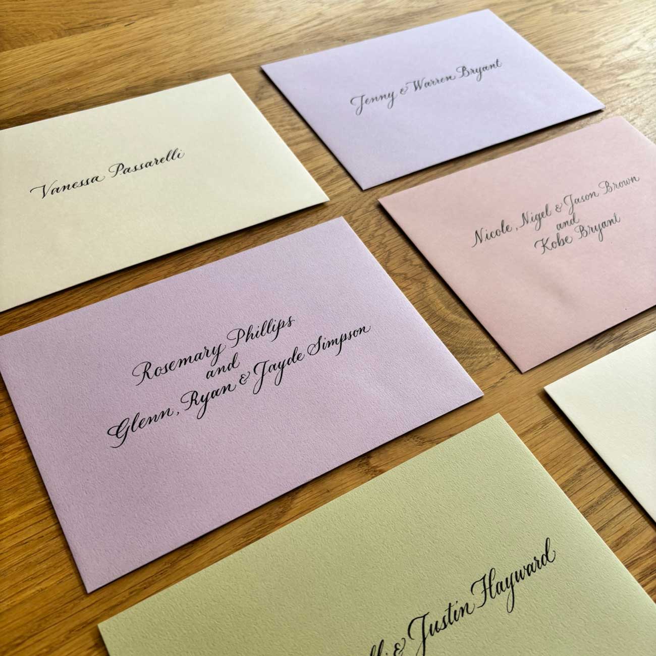 Pastel pink purple blue green euro flap envelope bundle assorted australia with calligraphy for wedding invitations