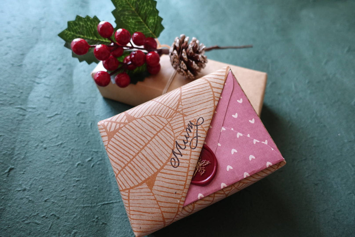 Gift wrapped with a card pocket and wax seal