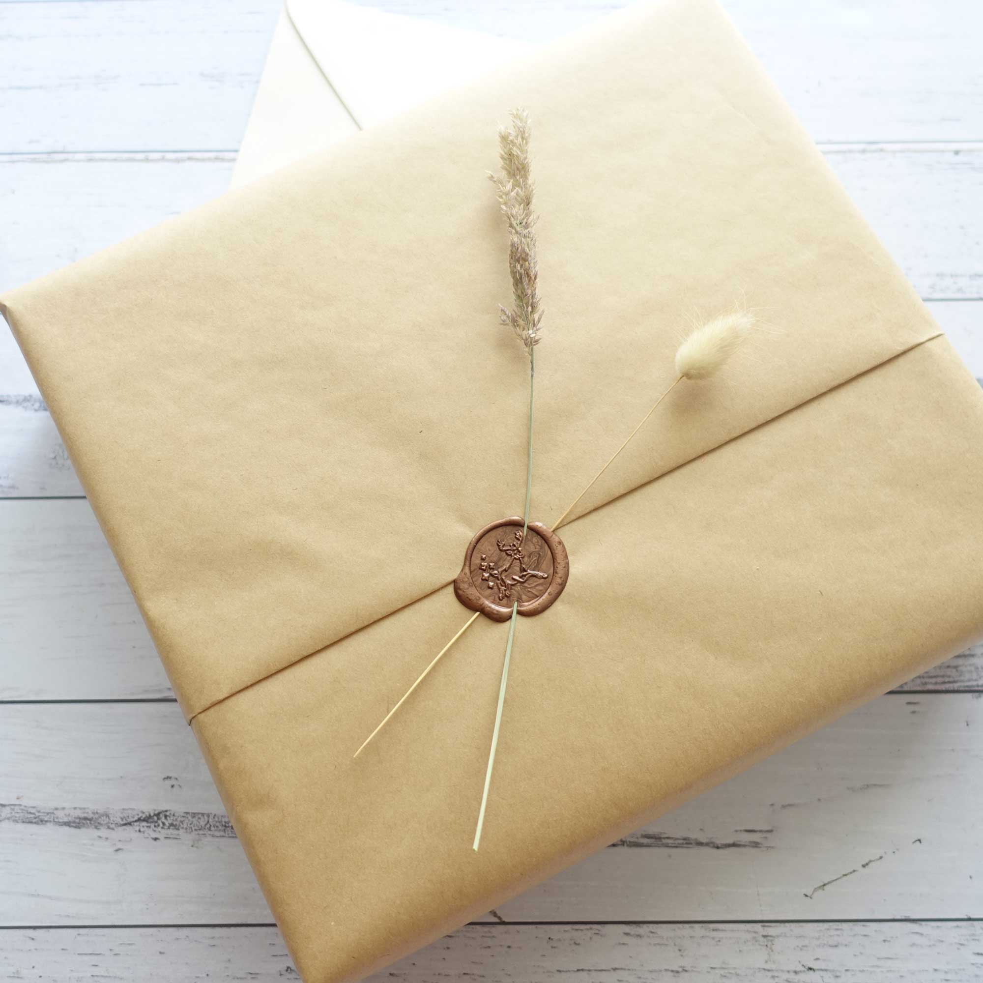 Reindeer wax seal Christmas gift wrapping idea