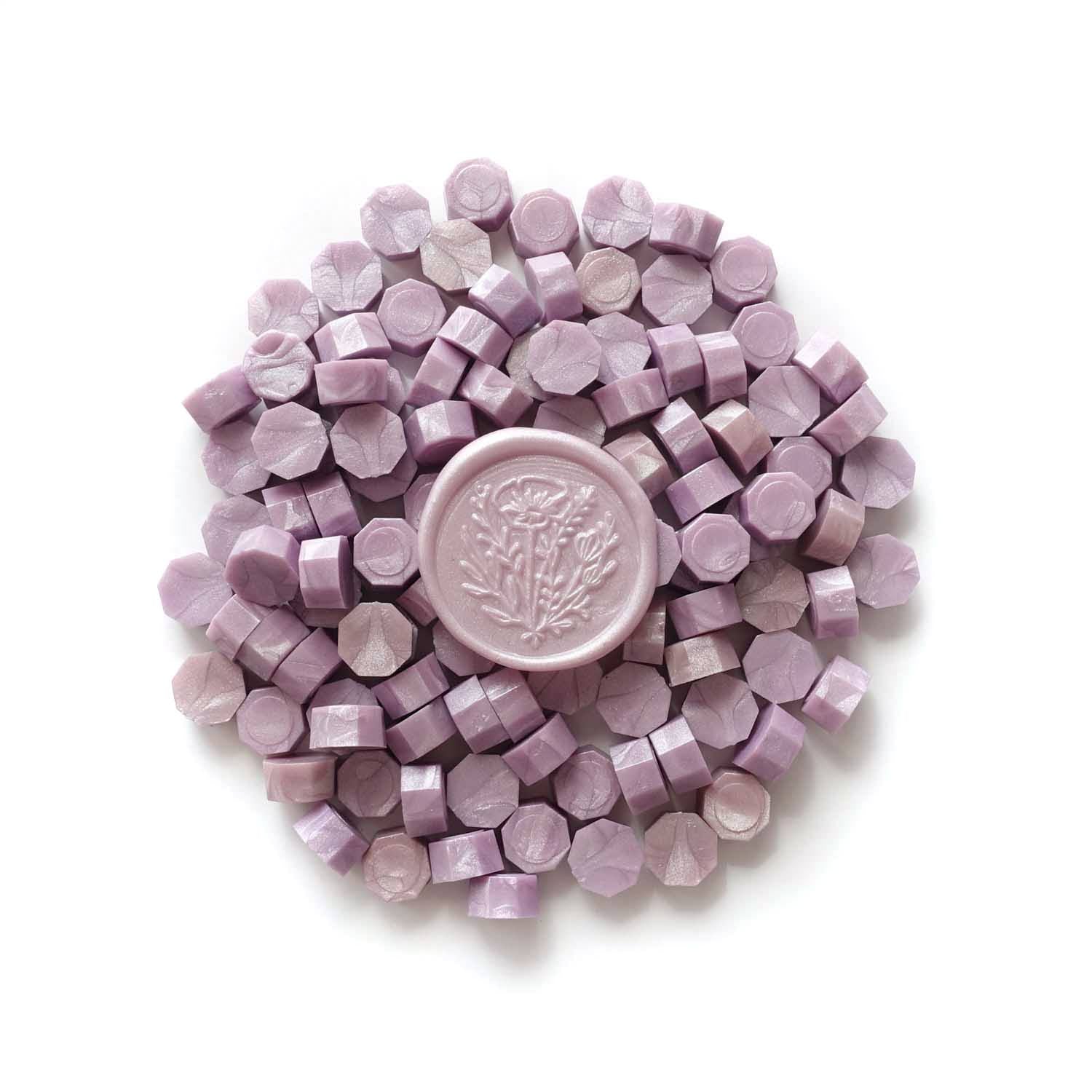 Pale light purple lilac lavender wax seal with wild flower Fiona Ariva granules