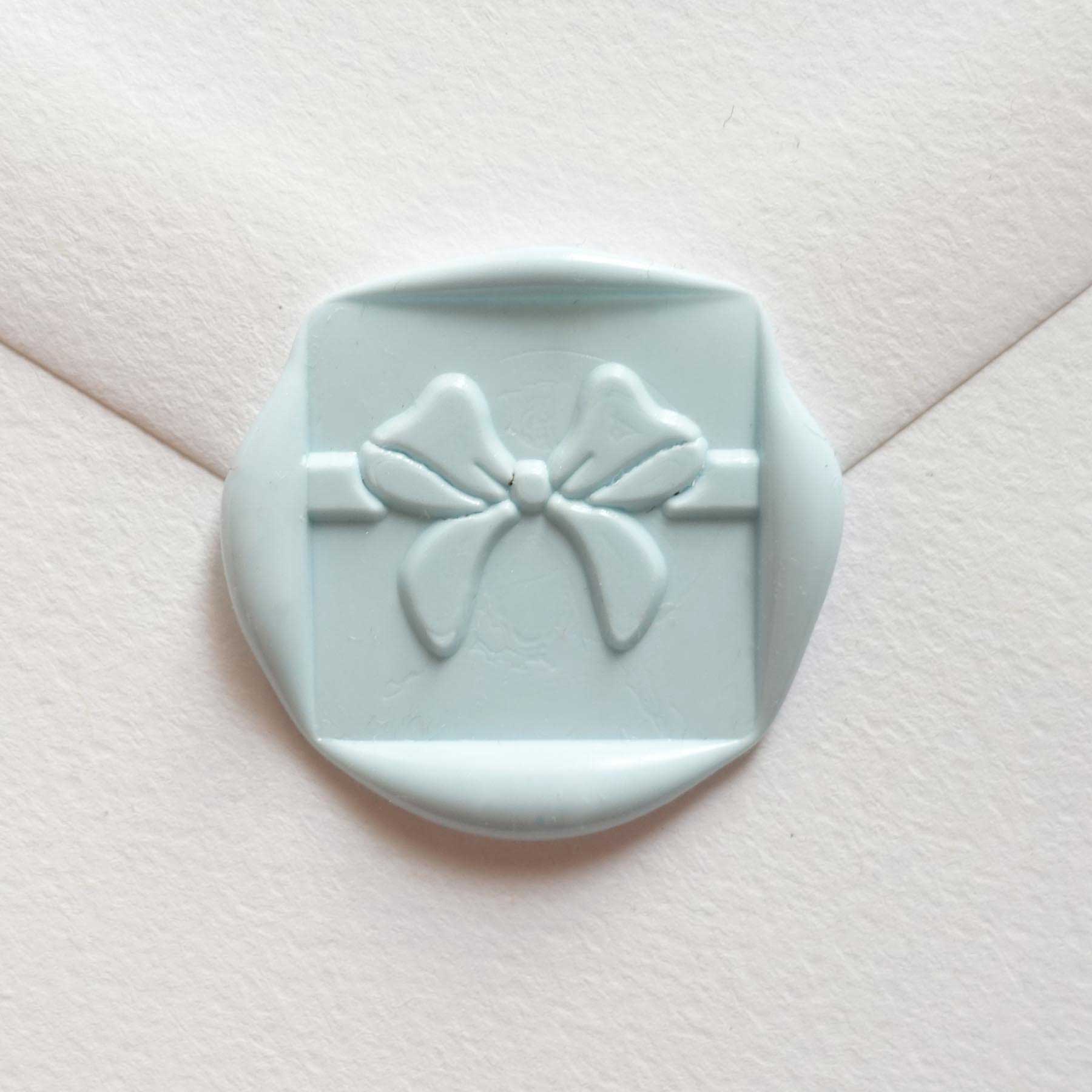 baby blue sealing wax with ribbon bow design fiona ariva australia