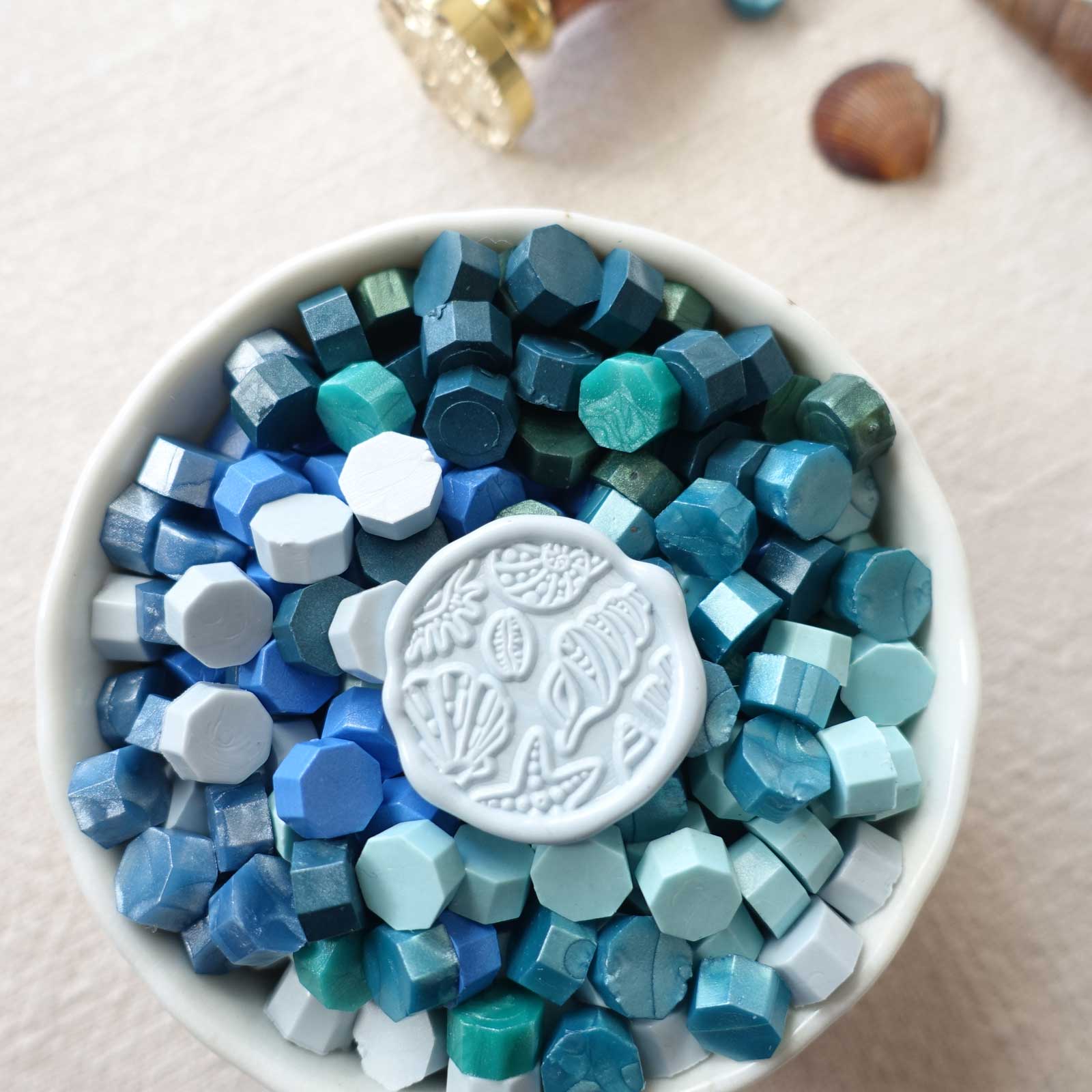 Seashells beach ocean blue wax seal granules fiona ariva australia