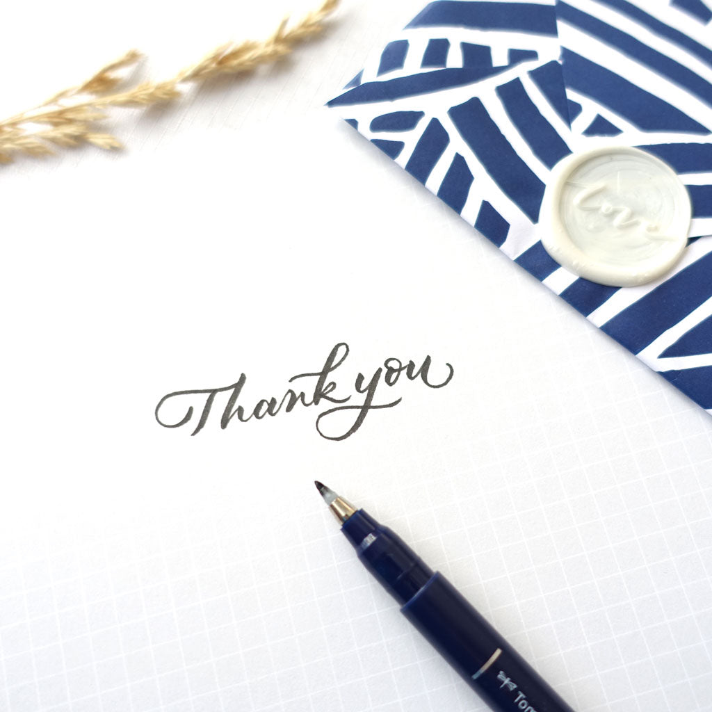 Thank you lettering calligraphy using Tombow fudenosuke hard tip brush pen