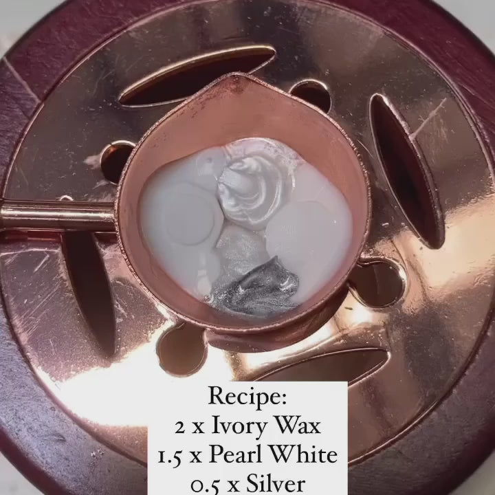 snowflake star wax seal with metallic foil flakes