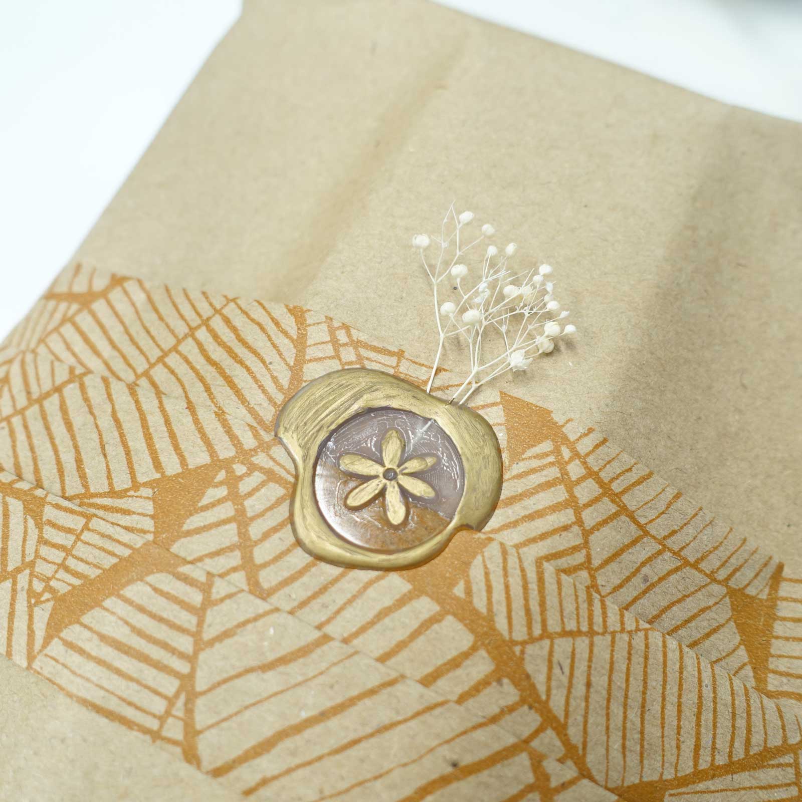 daisy wax seal gift wrapping kraft paper idea