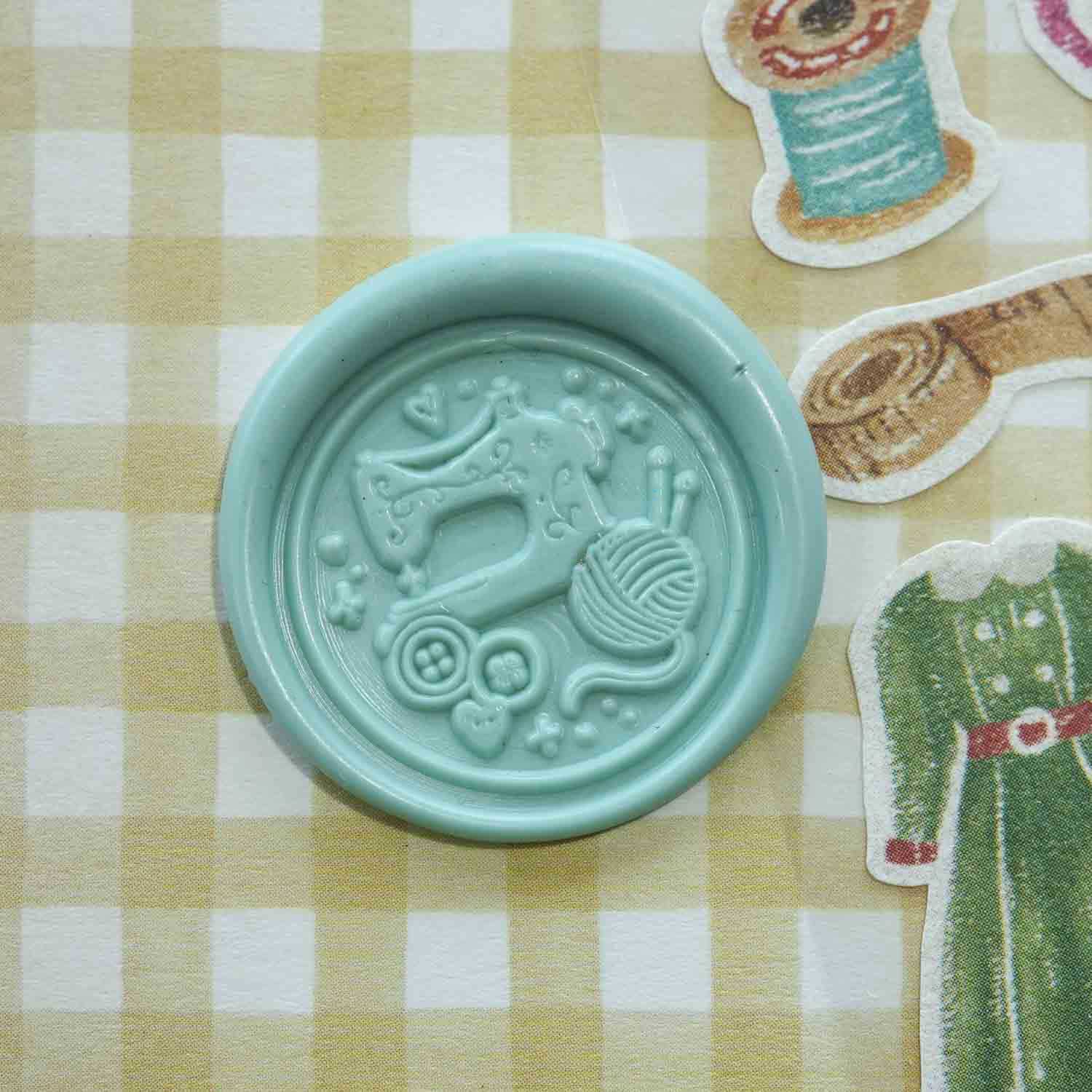 Sewing and yarn themed wax seal stamp with vintage sewing machine and buttons