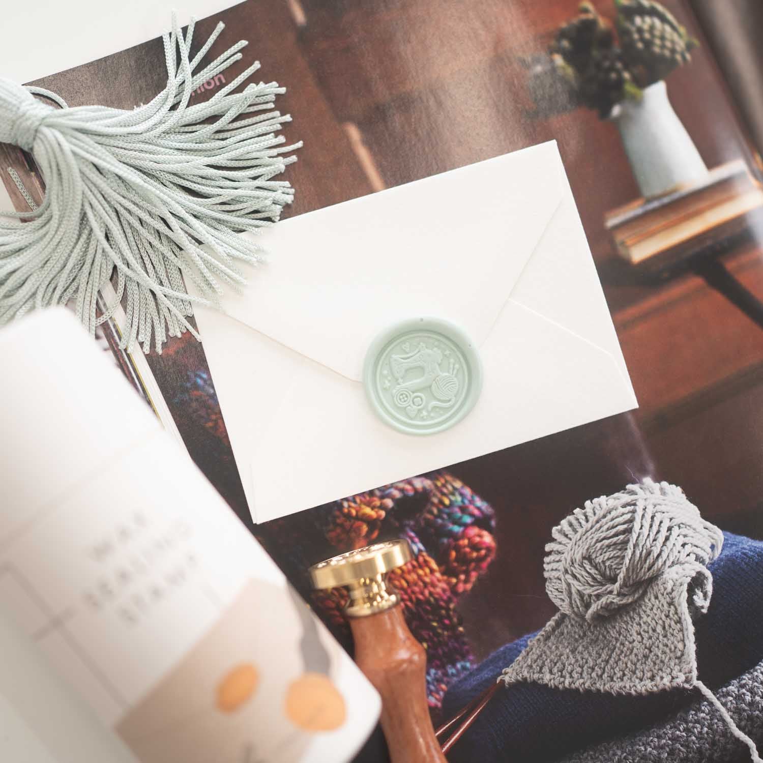 Sewing and yarn themed wax seal stamp with vintage sewing machine and buttons