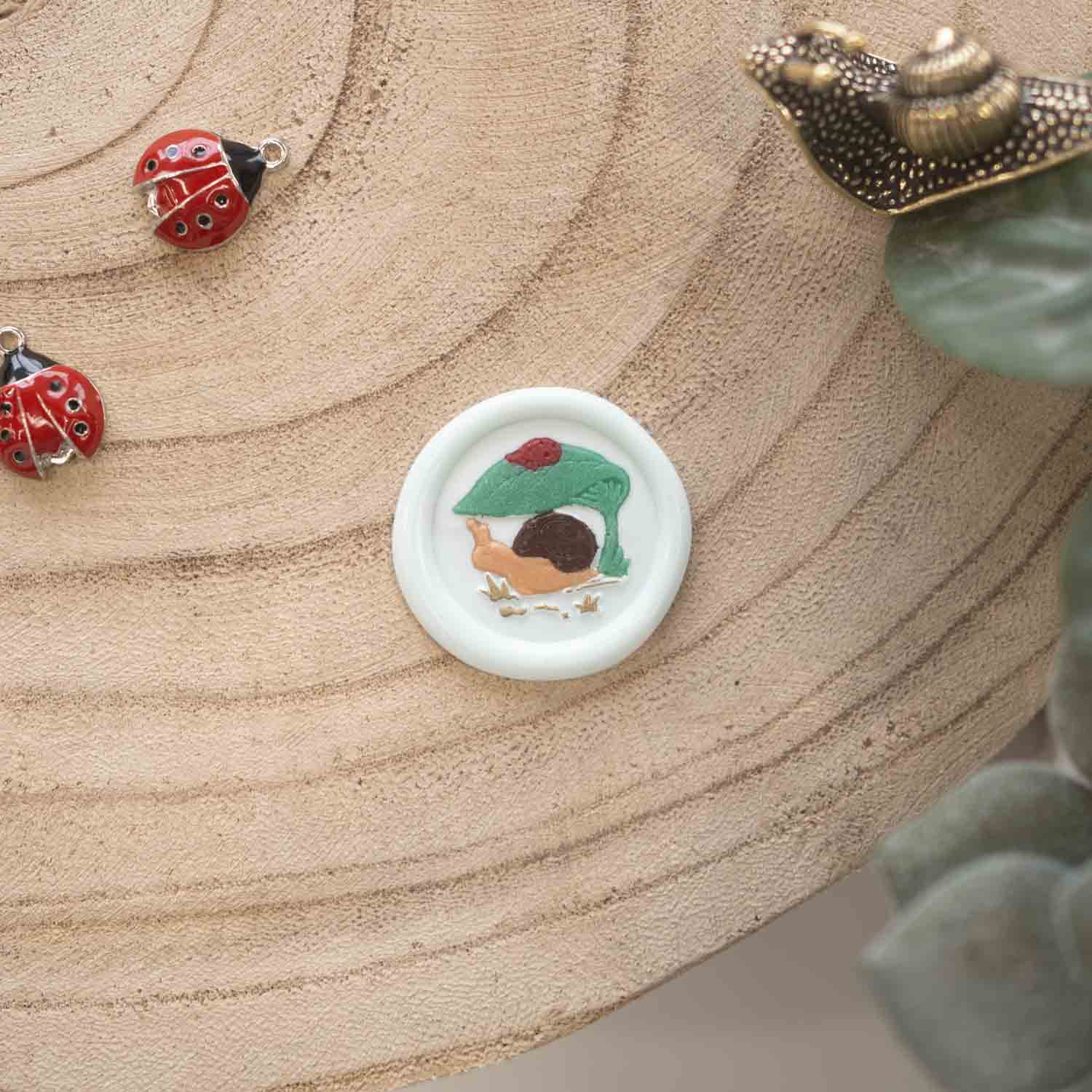 snail ladybird wax seal stamp design fiona ariva australia