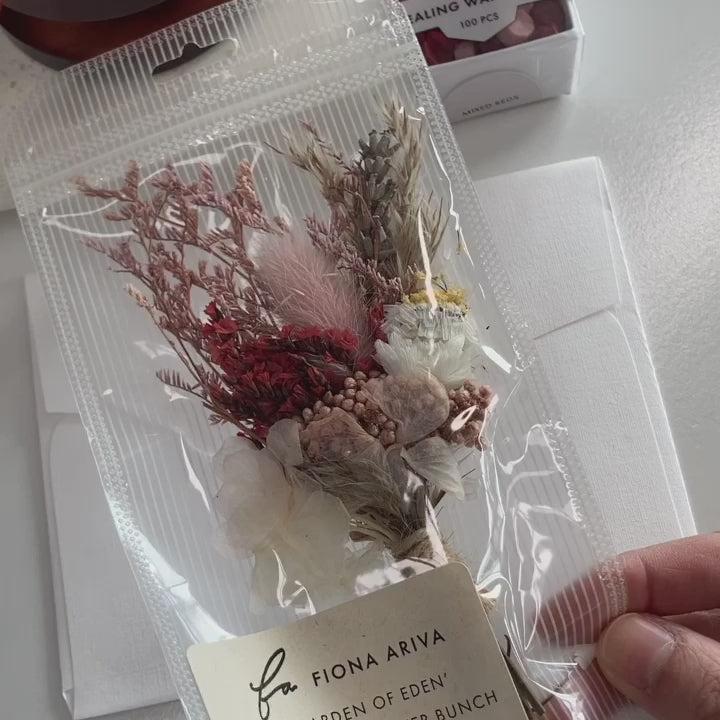 how to wax seal dried flowers  on envelope with wild flower stamp