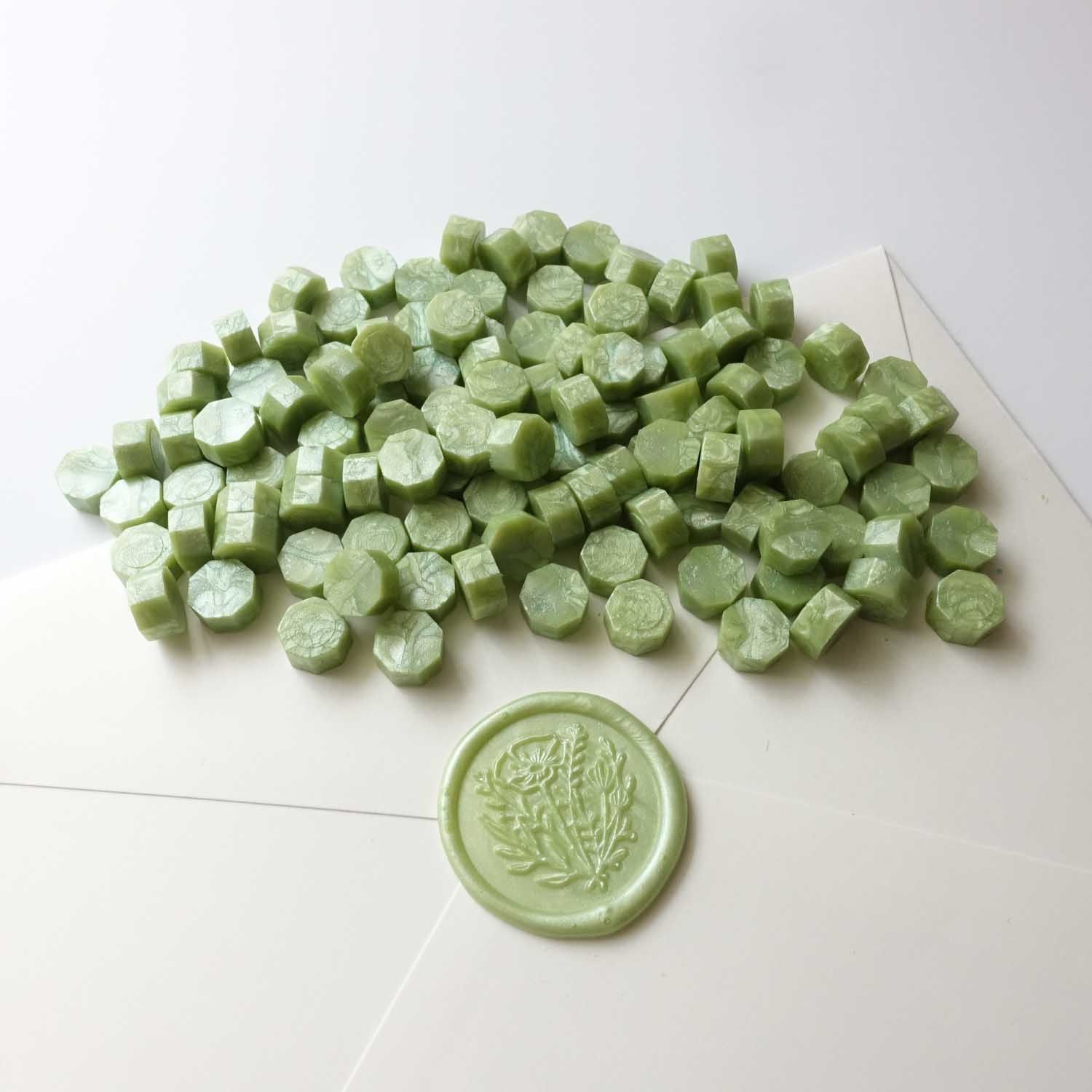 Light pale apple green sealing wax beads with wild flower poppy wax seal Australia