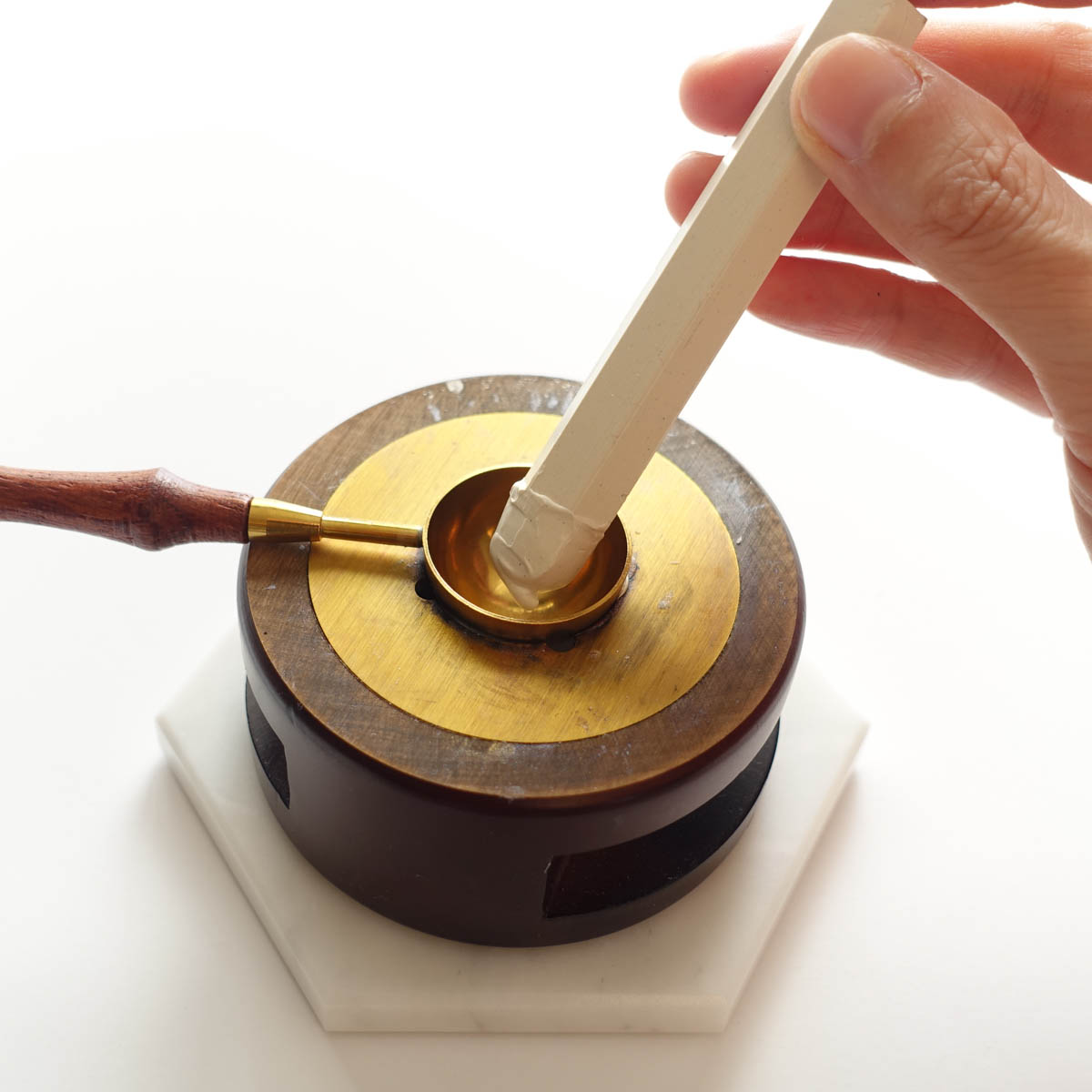 How to melt wax seal stick with spoon and stove holder