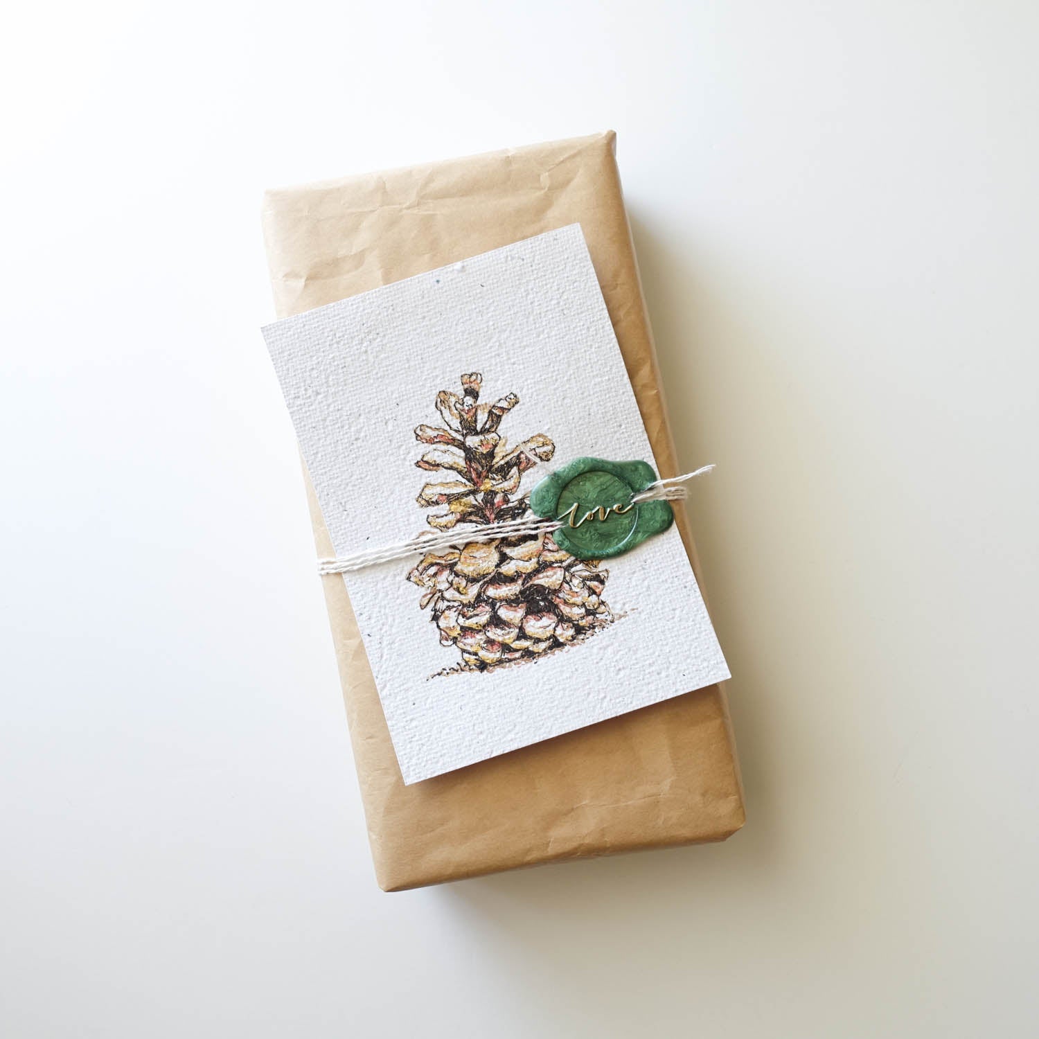 love wax seal pine cone drawing gift wrapping ideas
