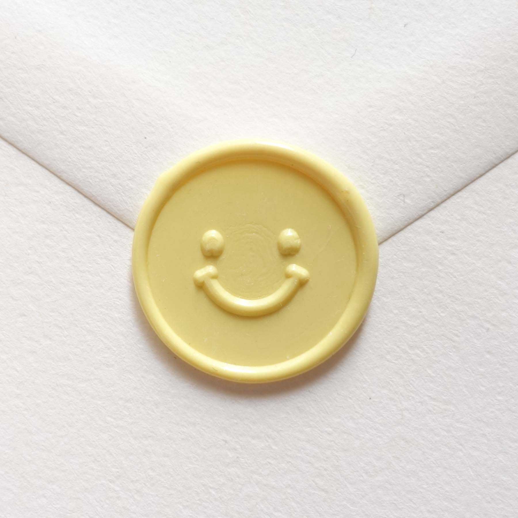 yellow smiley face emoji wax seal fiona ariva australia