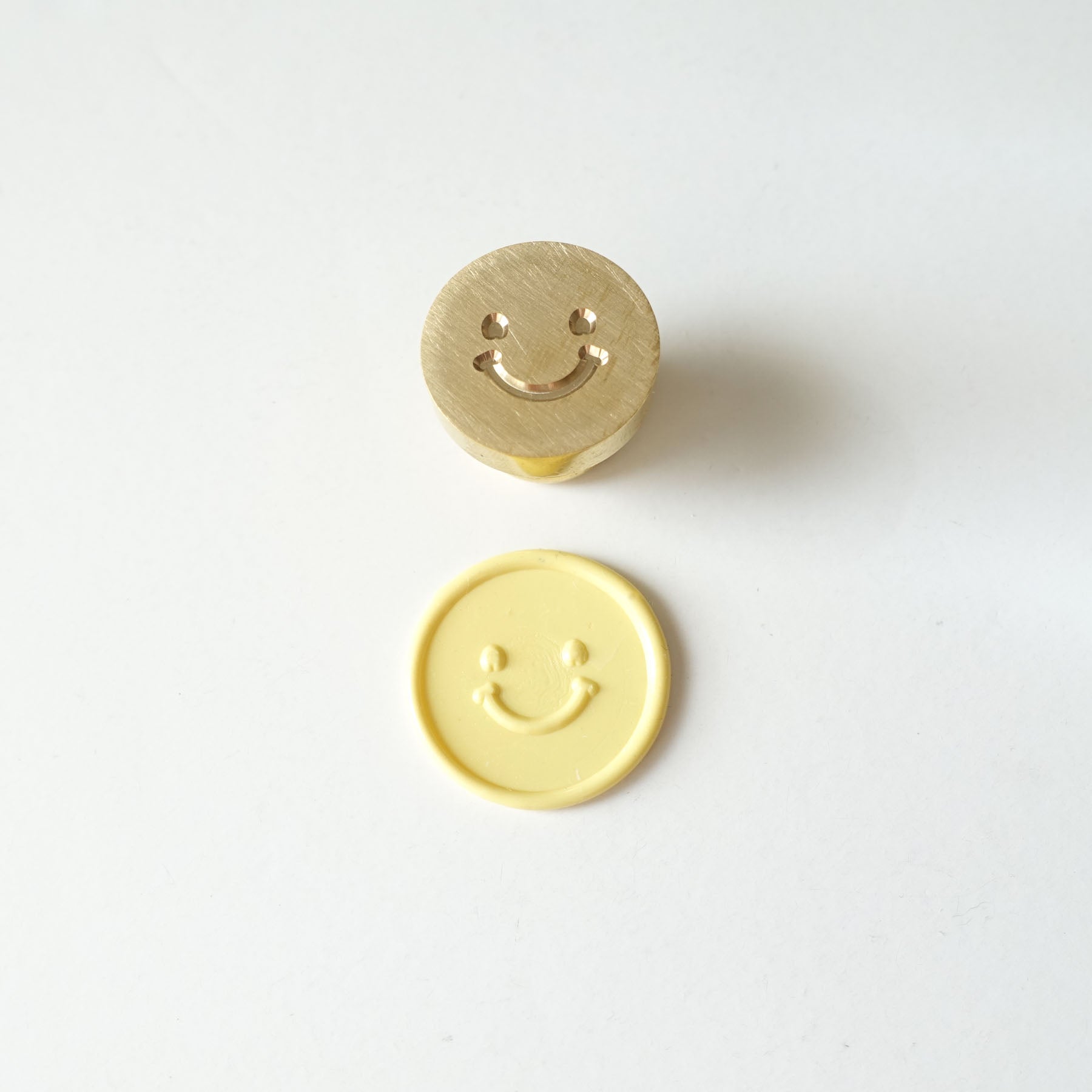 yellow smiley face emoji wax seal fiona ariva australia