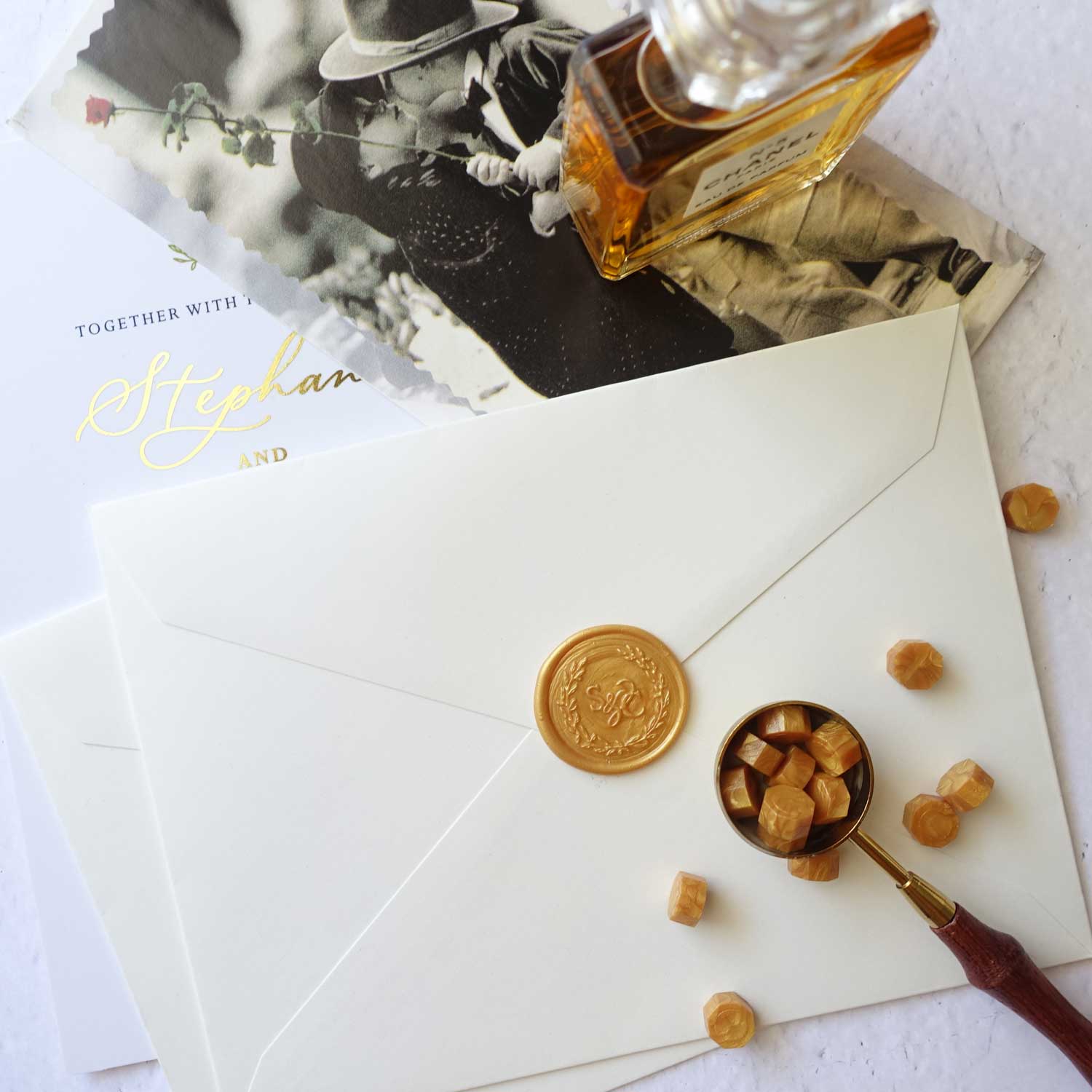 Gold custom monogram olive wreath wax seal for wedding invitations Australia