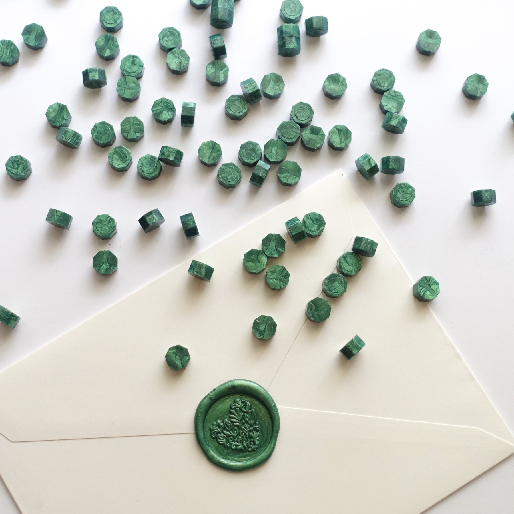 Forest dark emerald green sealing wax with botanical heart wax seal